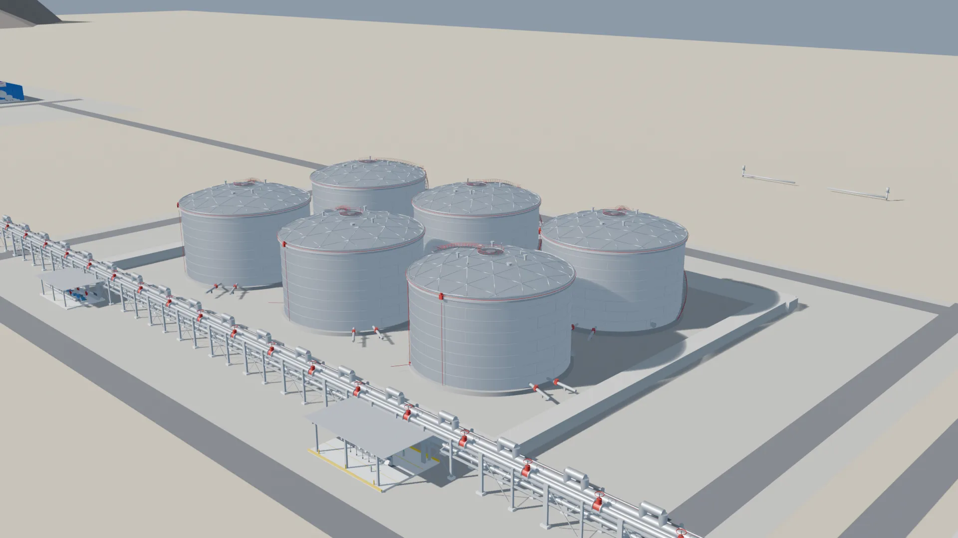 Completed tank terminal — six API 650 tanks, pipe rack, pump station, truck loading and export jetty
